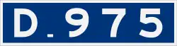 D975