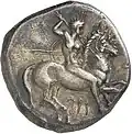 Didrachme. (ca. 325-281 v. Chr.), 22 mm. Nackter Reiter mit Schild und zwei eingelegten Speeren nach r. In der erhobenen r. Hand hält er einen Speer. (Avers).[80]