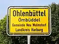 Ortstafel mit niederdeutschem Ortsnamen