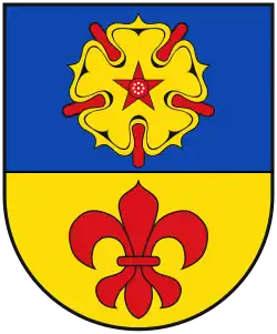 Wappen von Kevelaer: goldene Rose mit fünfzackigem Butzen und roten Kelchblättern