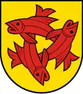 Musberg („In Gold ein Triangel aus drei überlappenden, auswärts gebogenen, roten Fischen.“)