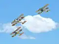 Nachgebaute Royal Aircraft Factory B.E.12 (unten) in Begleitung von einer De Havilland American D.H.4 (Mitte) und einer Royal Aircraft Factory R.E.8 (oben rechts).
