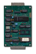 Platine mit Diskettencontroller, Software-ROM und An­steu­erungs­elektronik. Der freie ROM-Sockel kann mit zusätz­li­cher Software wie dem As­sem­bler Encoder09 bestückt werden.
