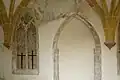 Ehemaliges Portal mit gotischem Fenster