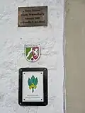 Denkmalschild an der Wasserburg