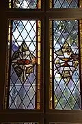 Fenster mit Brot und Abendmahlskelch