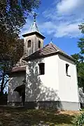 Glockenturm vor der Kirche Szent Kereszt felmagasztalása