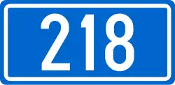 D218