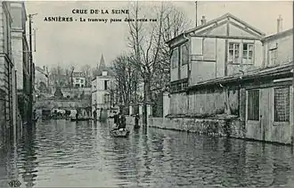 « Le tramway passait dans cette rue d'Asnières-sur-Seine » („Die Straßenbahn fuhr durch diese Straße von Asnières-sur-Seine“)