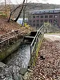 Ehrenberger Bach wird ab dem Mahnmal KZ Kemna verrohrt zur Wupper geführt
