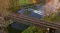 Eisenbahnbrücke der Bahnstrecke Memmingen-Leutkirch über die kanalisierte, nur Restwasser führende Iller