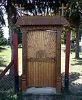 Eingang zum Friedhof von Baranyajenő