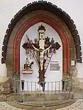 Arma-Christi-Kreuz an der Außenwand der Pfarrkirche Unserer Lieben Frau in Eppingen