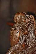 Detail Chorgestühl, Engel mit Wappen
