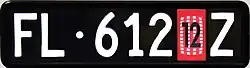 Befristetes Zoll-Kontrollschild für unverzollte Motorfahrzeuge. Die vorderen Zoll-Kontrollschilder zeigen aus Platzgründen einen Punkt anstelle des Staatswappens.