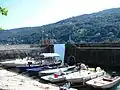 Der Hafen der Isola dei Pescatori mit der betenden Madonna.