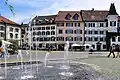 Springbrunnen, im Hintergrund der See-Quai