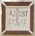 Wappenstein des Heiligkreuz-Ordens von 1751 am Pfarrhaus in Flein