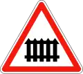 A7: Bahnübergang mit Schranken (Passage à niveau)