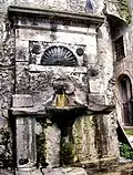 Die Funtana du Peshcaru (Brunnen der Puppe) zu Augurato