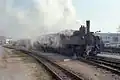 Waldviertler Schmalspurbahn: 298.207 (Baujahr 1905) verlässt mit ihrem Zug den Bahnhof Gmünd NÖ, aufgenommen 1990.