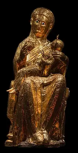 Die Statue wird im Textabschnitt Beschreibung der Skulptur beschrieben.