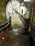 Kontrollgang unter dem Damm