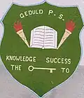 Das Wappen der „Geduld Primary School“ von Grünau