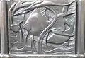 1. (eines der Reliefs)