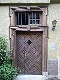 Barocktür von 1769 mit Deutschordenskreuz