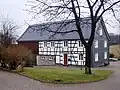 Wohnhaus in teilverschieferter Fachwerkbauweise in Wüste (2003)