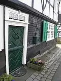Klön- und Kladdertür am Fachwerkhaus auf Heidt