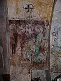Freskenreste am linken Apsisbogen