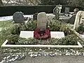 Grab auf dem Friedhof der Kirche Alt-St. Cyriak in Straßdorf.