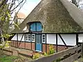 Fachwerkhaus mit Reetdach in Heringsdorf