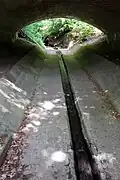 Oberhalb der Wasserfälle unterquert das Wasser eine Brücke der ehemaligen Leonberger Straße (B14)