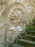 Vermauertes Portal datiert 1547 am Staffelgiebelhaus