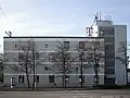 Der Hochbau für das Fernmeldeamt an der Ecke Ost-/Weinsberger Straße wurde am 7. August 1973 fertiggestellt.
