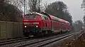 BR 218 mit Doppelstockwagen bei Murg