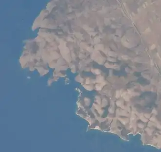 Satellitenaufnahme der Küste rund ums Kap Stillo mit der Bucht in der Mitte