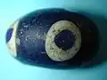 Eisenzeitliche Ringaugenperle aus Zentralengland.