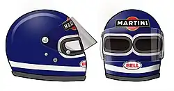Der Twin Window Helmet, wie ihn Jacky Ickx 1978 trug: Das Doppelfenster wurde entwi­ckelt, um zu verhindern, dass das Visier im Brandfall nach innen zum Gesicht des Fahrers hin schmilzt[3]