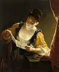 Junge Frau beim Lesen eines Briefes