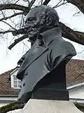 Hebeldenkmal vor der Peterskirche in Basel-Stadt. Büste (1898) von Max Leu (1862–1899) Bildhauer