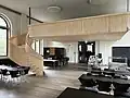 Aufgang zur Empore mit Sitzplätzen für die höheren Klassen