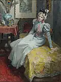 Junge Dame auf einem Divan