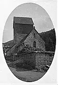 Ansicht von Nordwesten im Jahr 1926, noch mit alter Turmgestalt (Satteldach) und alter Eisenbahn-Gitterbrücke