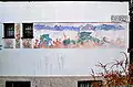 Gemalter Fries an der Nordwestwand von Lobissers Atelierhaus am Klagenfurter Lobisserweg 2