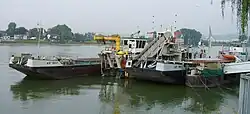 Selbstfahrende Klappschuten und Eimerkettenbagger