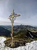 Gipfelkreuz mit Wendelsteingruppe